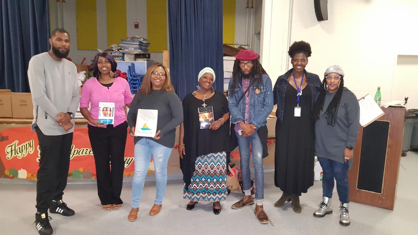 black american men and women holding books