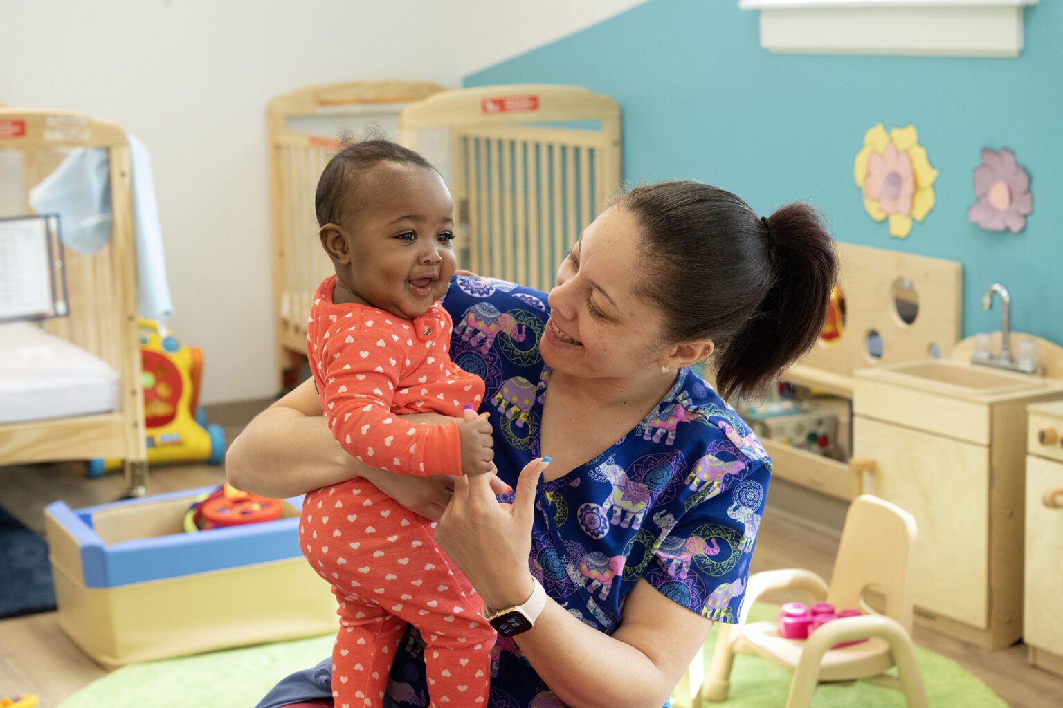 UPO educator Dominique Ennis-Bottoms nurtures Ava at our Randle Highlands Early Childhood Education Center.