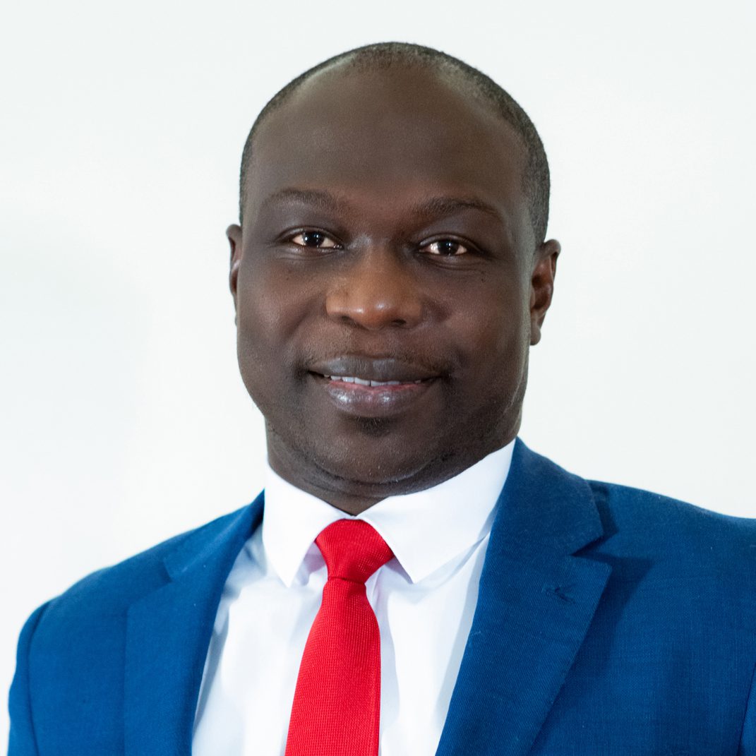 black-american man in business attire smiling