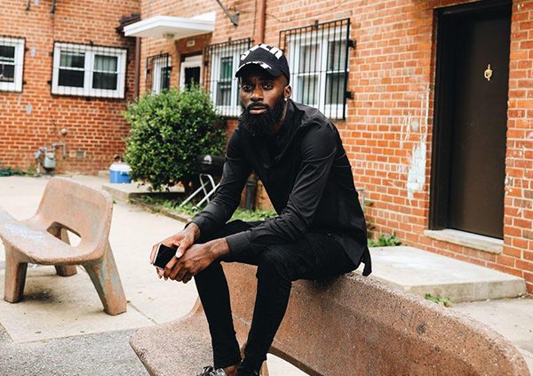 Freddie Jeffcoat sitting on the back of a bench