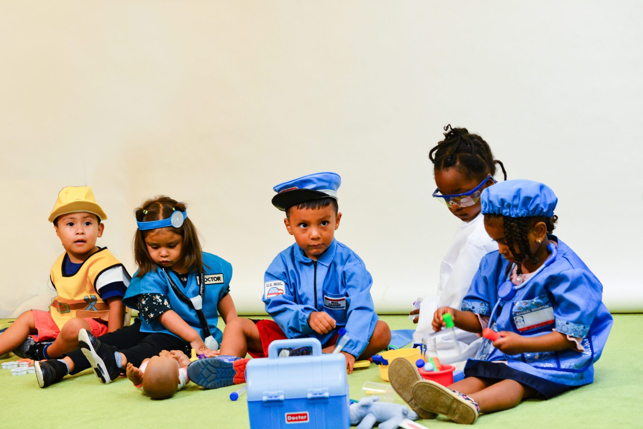 Children wearing costumes of various professions