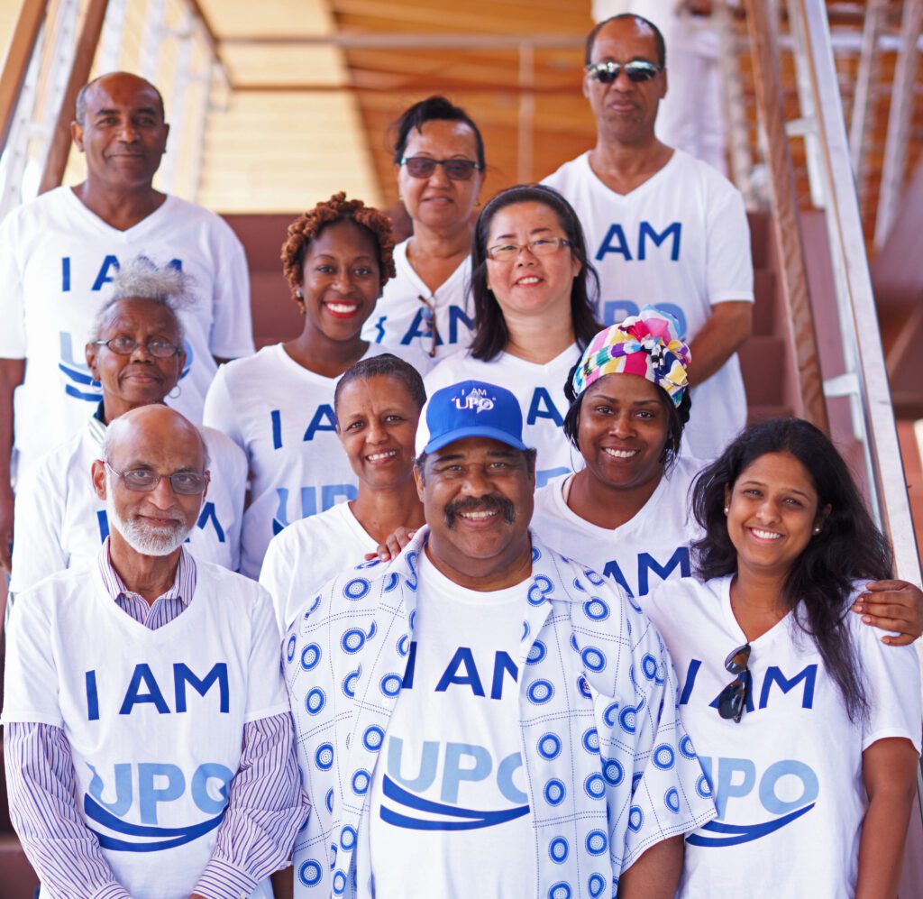 group of people of color wearing UPO t-shirts