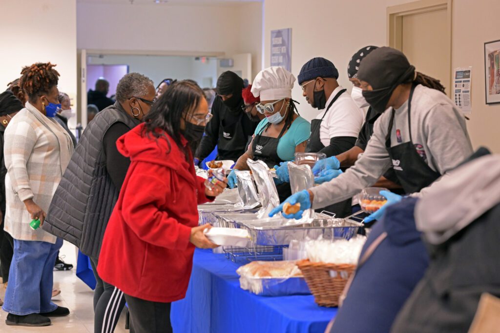 UPO volunteers serving food