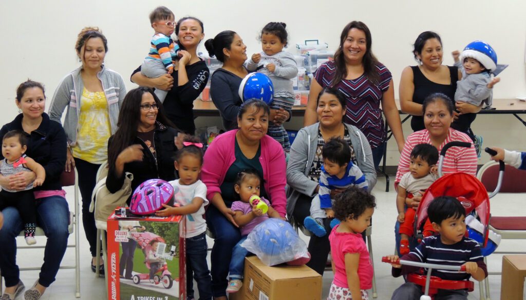 Group of parents and their young children