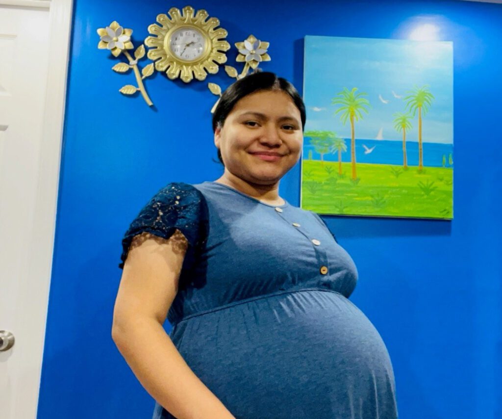 Pregnant woman smiling