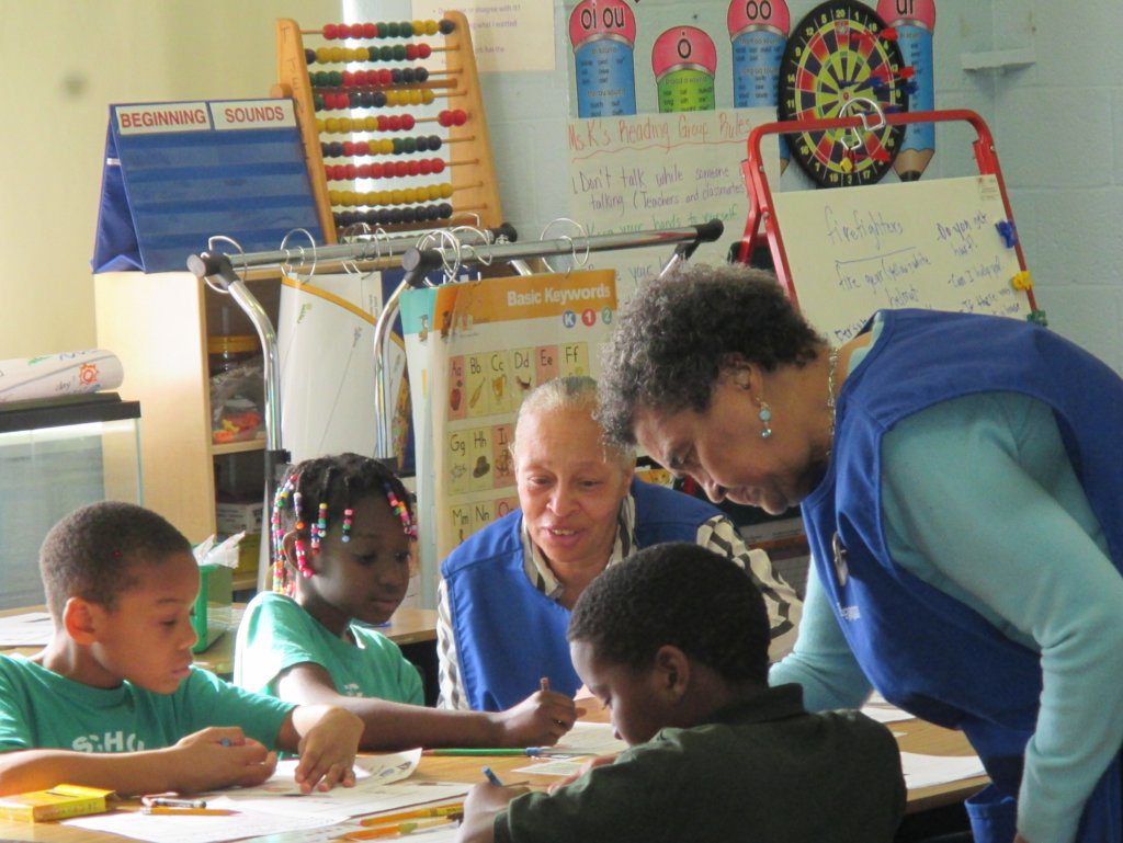 Foster grandparents teaching kids